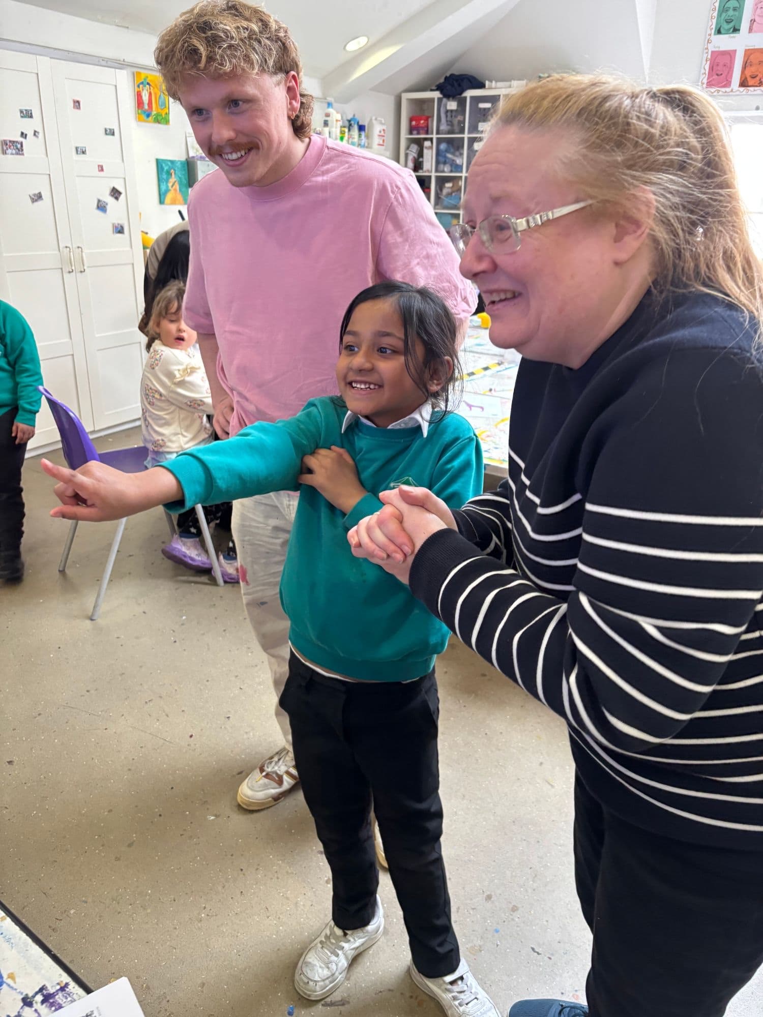 Doddz with children at a workshop