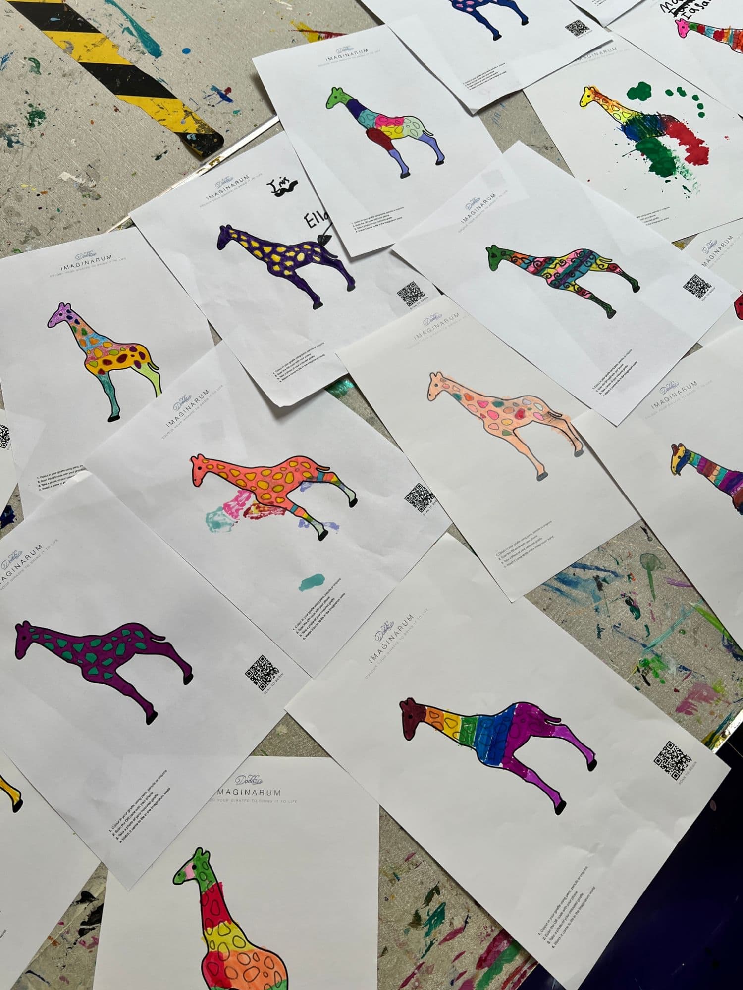 Coloured in giraffes from a Doddz workshop